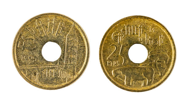 istock Spanish coins - 25 pesetas. Juan Carlos I. Castile and Leon, 1995 1411760124