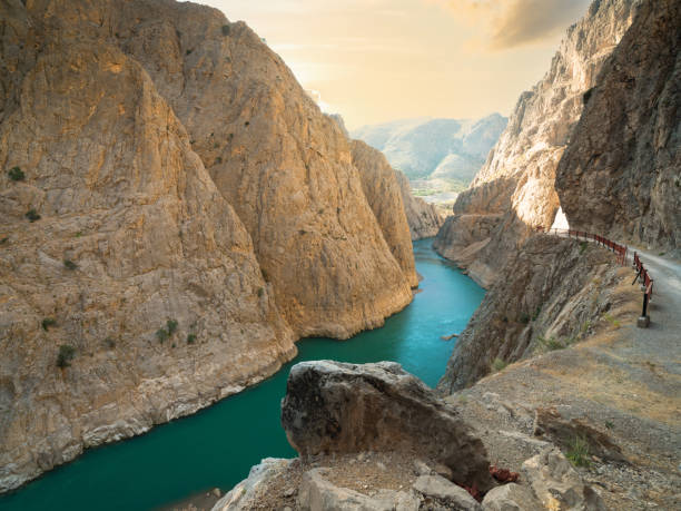 istock Sunrise in the Dark Canyon 1411762696