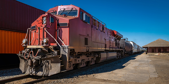 Cargo train parked in the Moose Jaw railway station in Saskatchewan, Canada