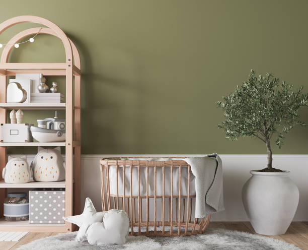 Nursery design, wooden furniture in green baby room, Scandinavian style stock photo