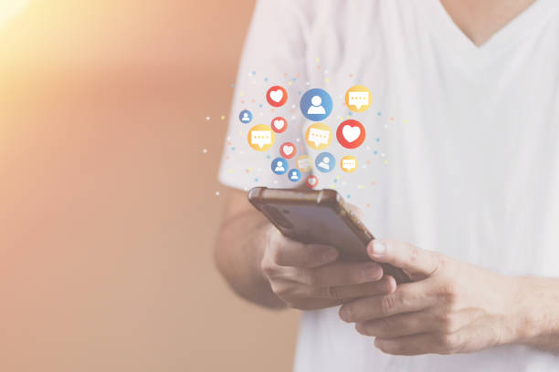 istock Social media technology concept, man hand using smartphone Login to the online network Use social media to do business and marketing payment from home through the Internet. 1411767020
