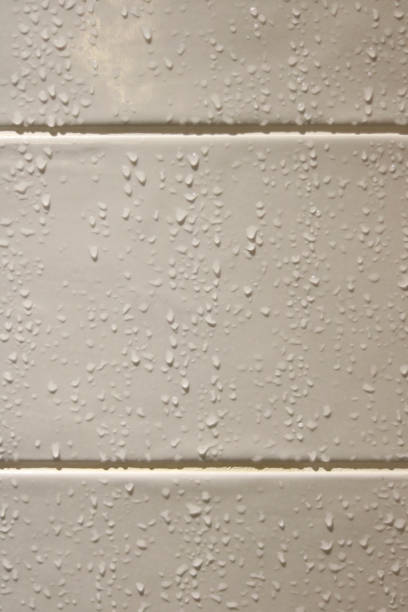 istock Vertical image of wet shower tiles 1411772972