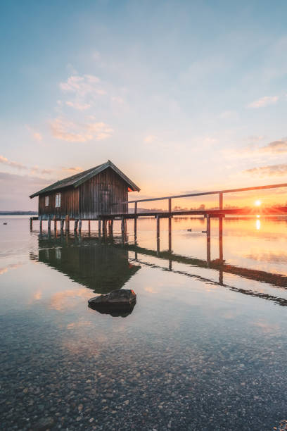 A shed and a wood quay on the lake of Starnberg