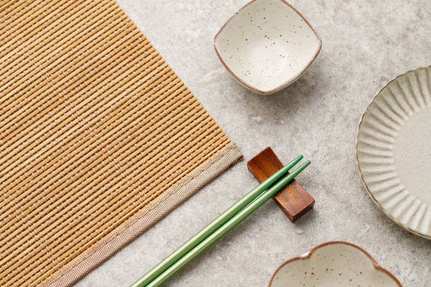 istock A table with Japanese plates and chopsticks. Japanese food image.Flat lay. 1411773668