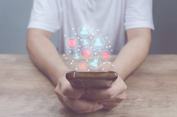 istock Social media technology concept, man hand using smartphone Login to the online network Use social media to do business and marketing payment from home through the Internet. 1411776121