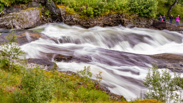 Long exposure of fast running river in Olden Norway stock photo