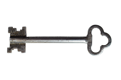 Old key isolated on a white background. Clipping path included.
