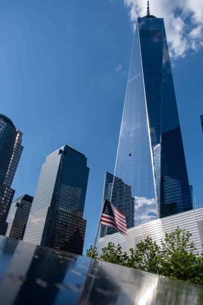 Freedom Tower reflections The light reflection in the freedom Tower at one world trade center, in the 9 11 Memorial to the struggle against world terrorism statue photos stock pictures, royalty-free photos & images