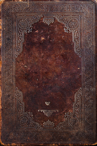 Antique leather-bound book cover texture. Ancient bible cover early 18th century