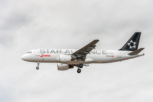 London, United Kingdom - August 22, 2016: HB-IJO Swiss Star Alliance Livery Airlines Airbus a320 Landing in London Heathrow International Airport. England.