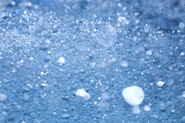 istock Clear water with white foam and air bubbles. 1411781748