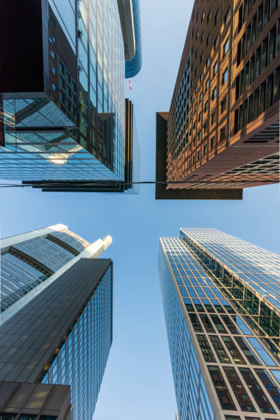 istock Looking up at skyscrapers in Frankfurt's banking district 1411783782