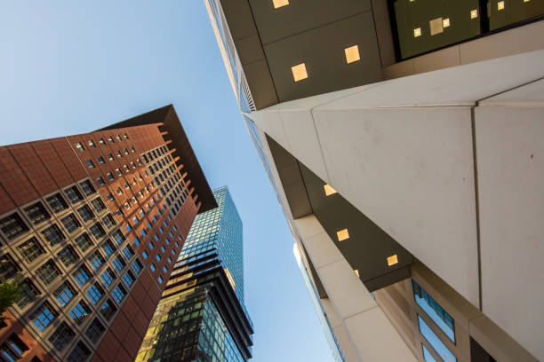 istock Looking up at skyscrapers in Frankfurt's banking district 1411783819