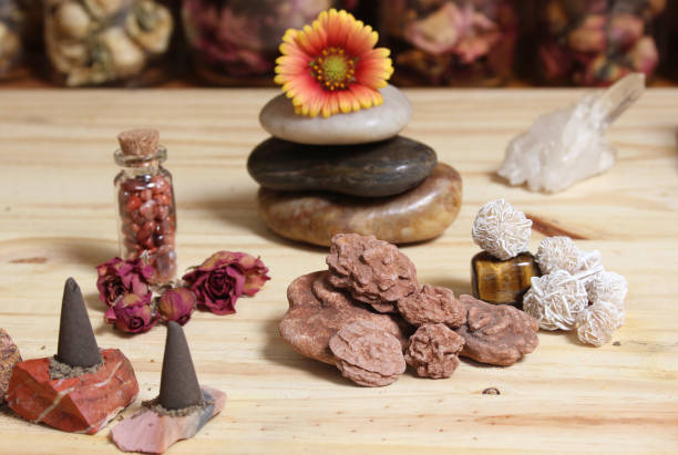 istock Incense Cones and Desert Rose Rocks on Meditation Table 1411786143