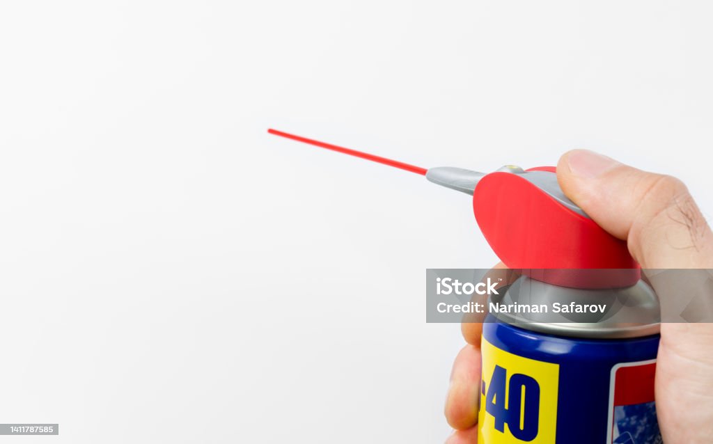 WD40. Anti-rust cleaner on a white background Business Stock Photo