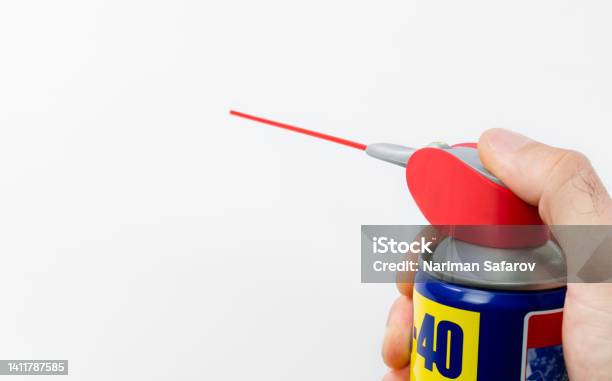 Wd40 Antirust Cleaner On A White Background Stock Photo - Download Image Now - Business, Spray, Crude Oil