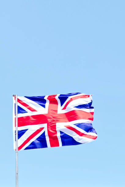 istock Union Jack flag suspended high in sky 1411799452
