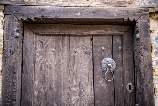 Three vintage door locks with gold key