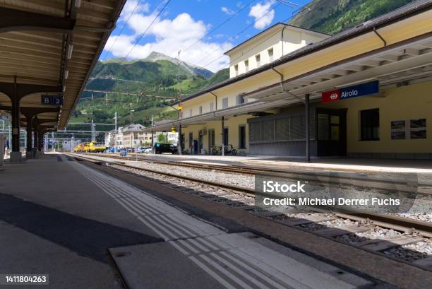 Railway Station Airolo Canton Ticino With Railway Tracks And Platform On A Sunny Summer Day Stock Photo - Download Image Now