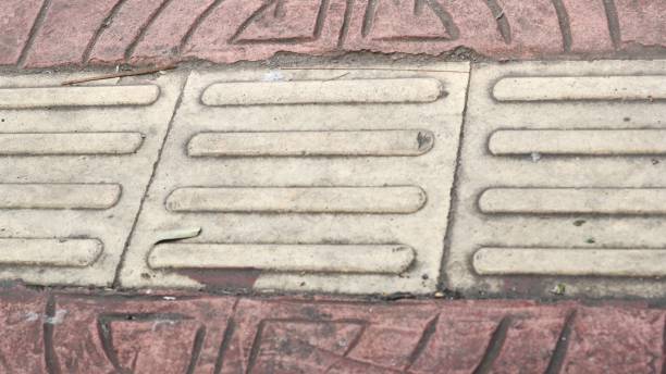 istock special ceramics installed on highway pavements for the blind. 1411809716