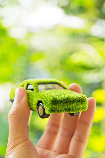 istock Hand Holding Eco car icon 141181100