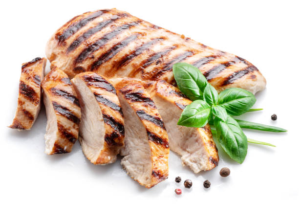 istock Grilled chicken fillet with herbs isolated on white background. 1411811140