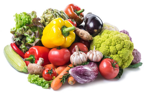 istock Variety of fresh organic vegetables on white background. 1411811596