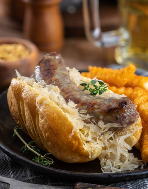 istock Grilled bratwurst and sauerkraut on a bun 1411813069