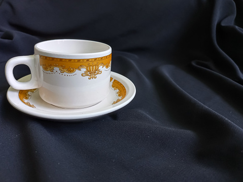 porcelain teacup with floral pattern