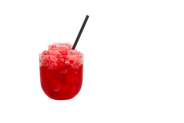 Fruit Shaved ice with natural juice. Red Slush drink isolated on white background. Design element, copy space. Template for menu restaurant, bar, cafe. Summer refreshment drink Fruit Shaved ice with natural juice. Red Slush drink isolated on white background. Design element, copy space. Template for menu restaurant, bar, cafe. Summer refreshment drink. strawberry crush stock pictures, royalty-free photos & images