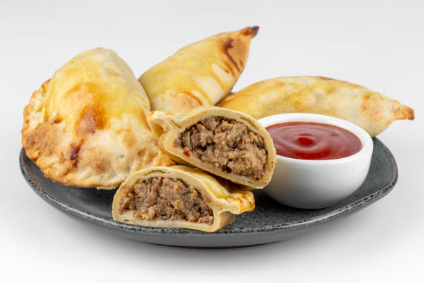 istock Argentine empanada isolated on white background. 1411819990