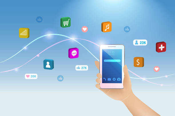 istock Hand holding smartphone with 3D mobile applications and social media icons. 1411821218