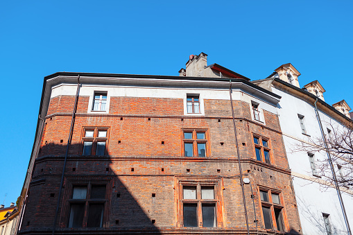 Building with brick wall in Turin