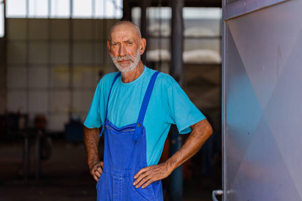 istock Serious man manufacturing in a workshop 1411844857