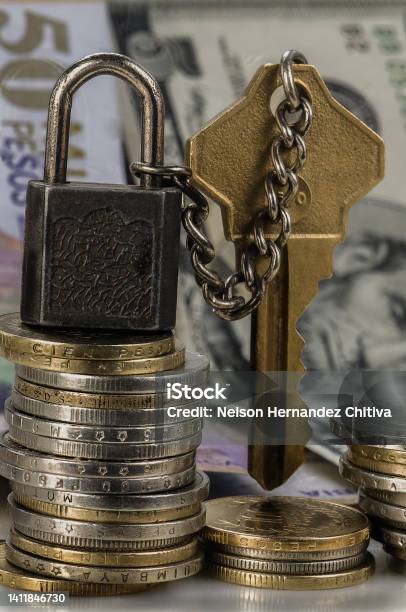 Padlock With Chain Coins And Bottom Dollars Stock Photo - Download Image Now - Colombia, Color Image, Fortuna