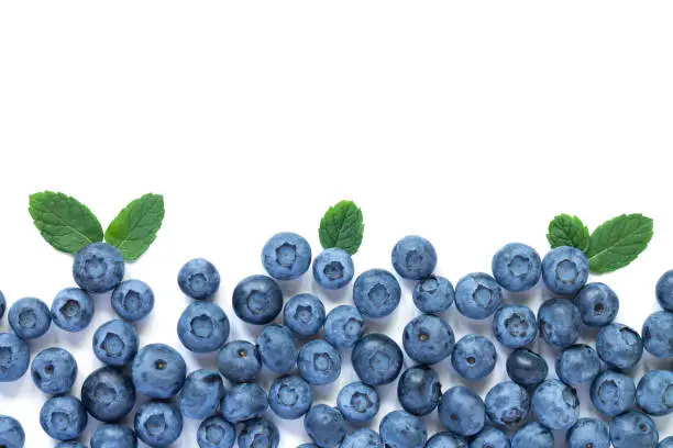 Photo of Blueberry and leaf frame background isolated top view