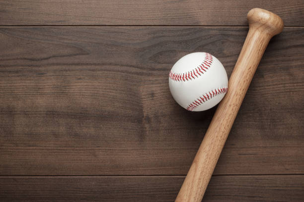istock baseball bat and ball 1411849615