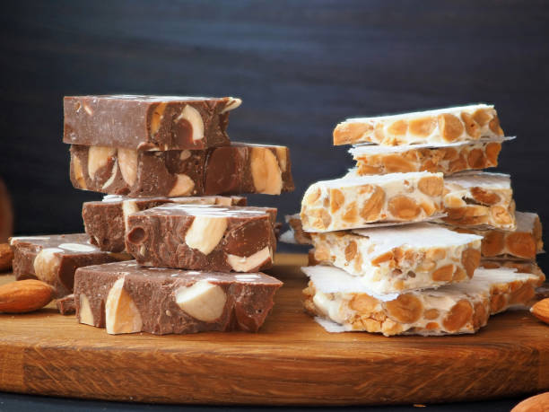 istock Sugar and Chocolate Turron or nougat with nuts 1411850610