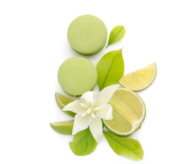 istock Citrus lime and green macarons on a white background. 1411851285