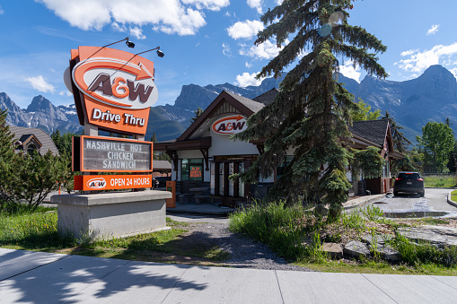 Canmore, Alberta, Canada - July 7, 2022: An A&W fast food restaurant, famous for its root beer, on a sunny summer day