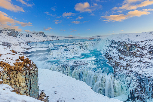 Picture of Gullfoss waterfall in Iceland in winter daytime with blue sky