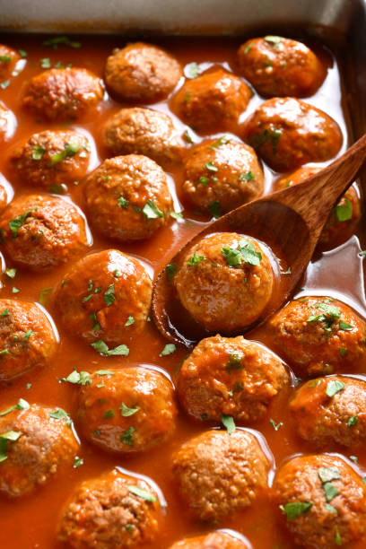 istock Meatballs with tomato sauce in baking dish 1411863004
