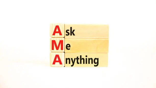 Photo of AMA ask me anything symbol. Concept words AMA ask me anything on wooden blocks on a beautiful white background. Business and AMA ask me anything concept. Copy space.