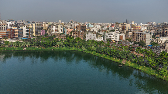 Beautiful aerial photo of the cityscape of Dhaka with beautiful waterbody, the capital city of Bangladesh. The photo was taken at the Hatirjheel, Dhaka