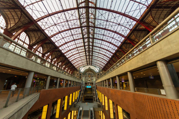 Snapshot at Antwerp Central Station in Belgium, on a quiet Saturday evening. The city is the capital of Antwerp Province in the Flemish Region. Note the aesthetics and cleanliness, as well as the architectural beauty of the building. Photographed on July 23, 2022