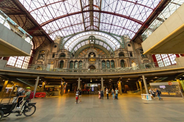 Snapshot at Antwerp Central Station in Belgium, on a quiet Saturday evening. The city is the capital of Antwerp Province in the Flemish Region. Note the aesthetics and cleanliness, as well as the architectural beauty of the building. Photographed on July 23, 2022