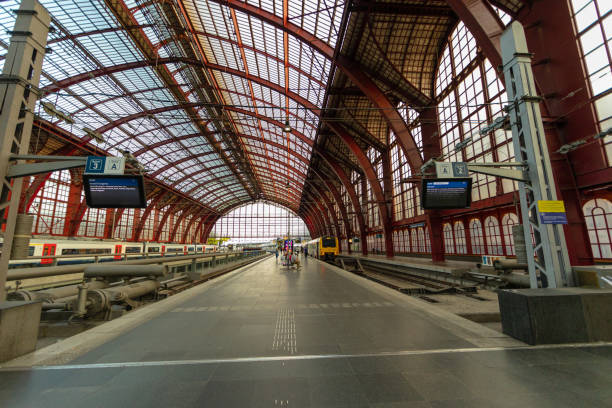 Snapshot at Antwerp Central Station in Belgium, on a quiet Saturday evening. The city is the capital of Antwerp Province in the Flemish Region. Note the aesthetics and cleanliness, as well as the architectural beauty of the building. Photographed on July 23, 2022