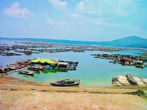 Fishing boats anchored on cirata lake