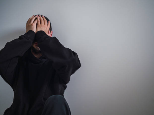 istock Desperate unrecognizable man with depression and copy space 1411877987