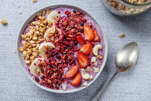 istock Fruity healthy muesli bowl on table 1411881880